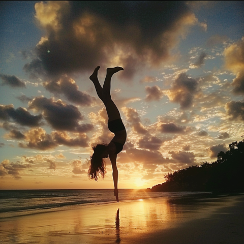 Chitrmela 21 yr woman doing a handstand on a beach at sunset pho 20af84d4 9cc0 4e61 b714 e96bf1638566 3